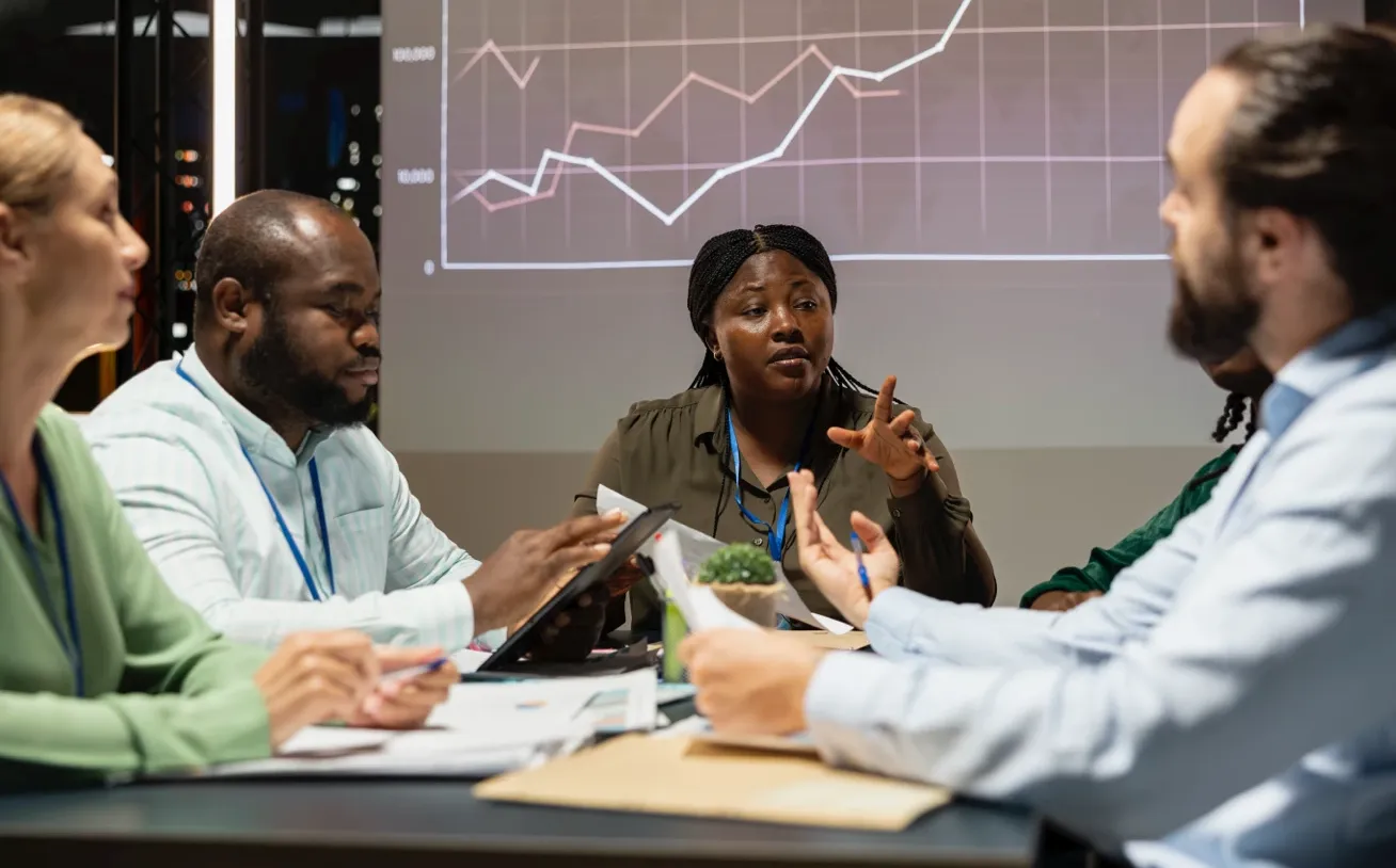 A PowerPlan employee providing budgeting and forecasting details to a client.