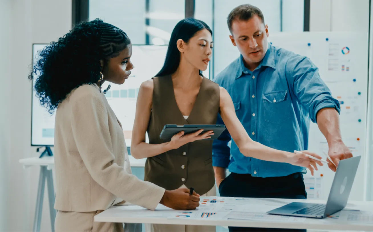 PowerPlan Tax professionals discussing details with a client.