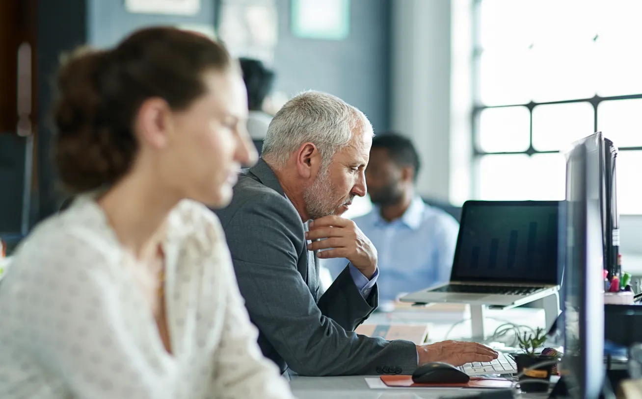 PowerPlan accountants working in the office.