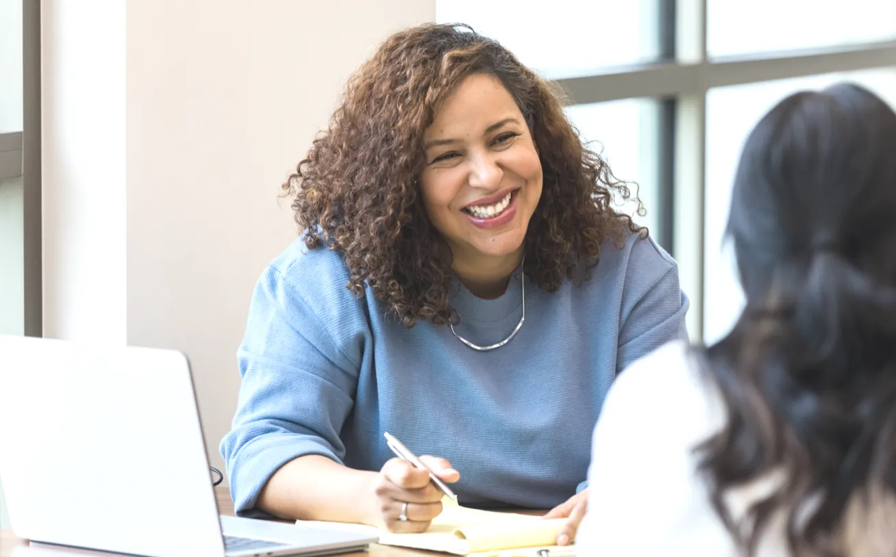 PowerPlan Diversity & Inclusion Council member meeting with an employee.