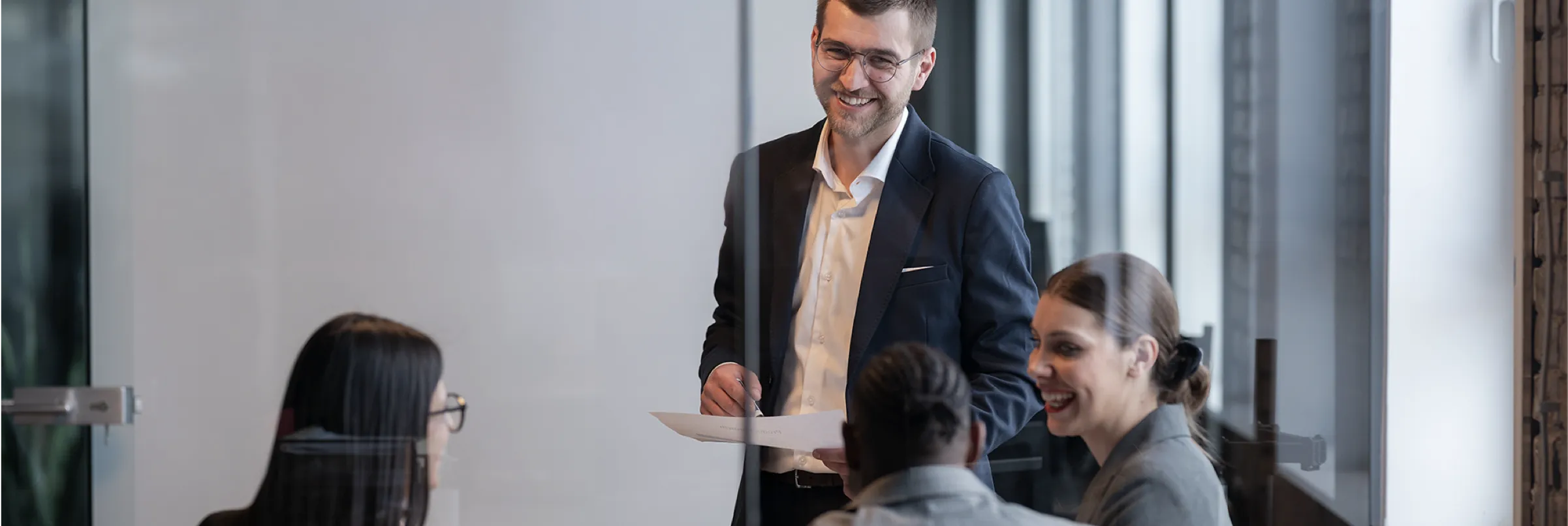 PowerPlan employee having a meeting.